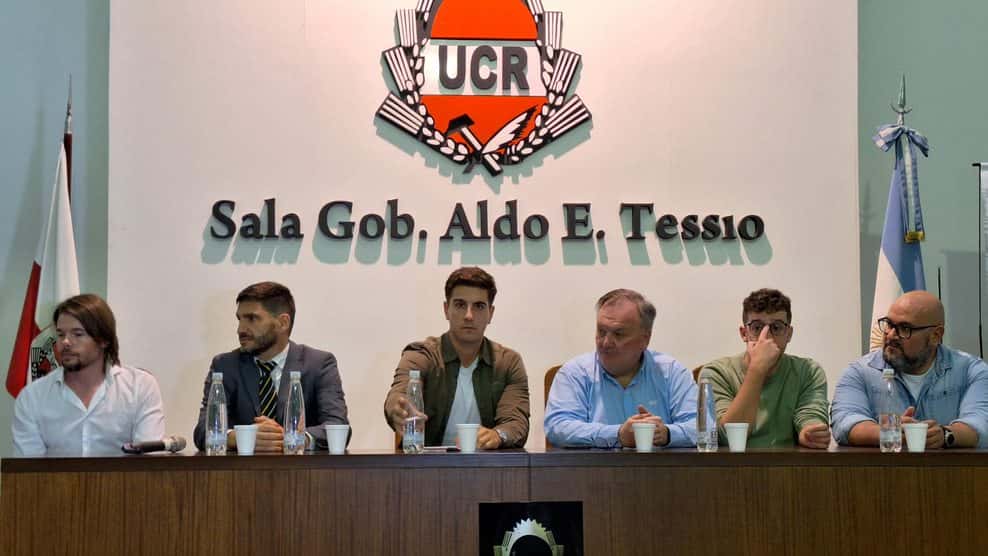 En el centro de panel, Maximiliano Pullaro, Guillermo Gallo y Felipe Michlig.